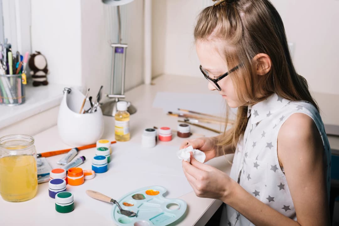 Person passionately working on a craft project